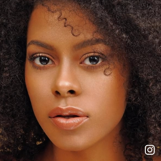 Girl posing front-facing with makeup for a social event in Miami, available for home service