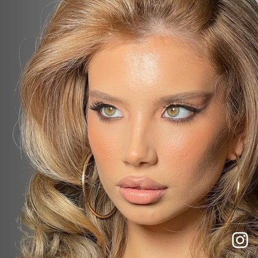 Girl posing front-facing with makeup and hair for a social event in Las Vegas, available for home service